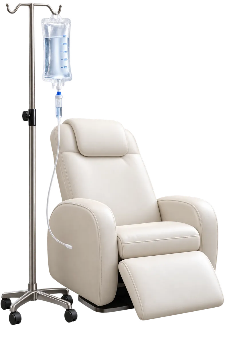 IV drip stand beside a comfortable cream treatment recliner